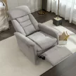 Relax fotel beépített elektromos vezérléssel, szürke szövetkárpittal.